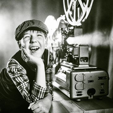 Boy with vintage film projector